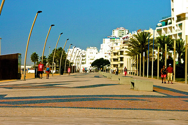 The long sidewalk along Quarteira beach called calçadão